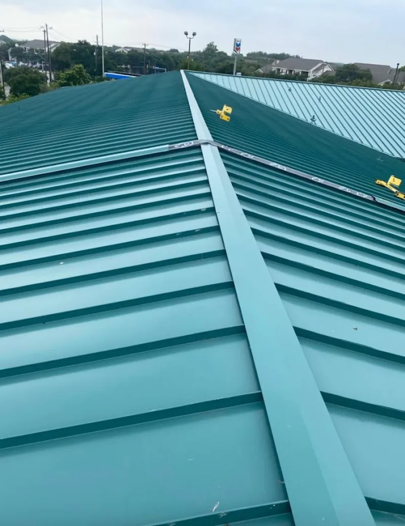 Green commercial metal roof ridge and valley for Metal Roof Repair in Robertsdale